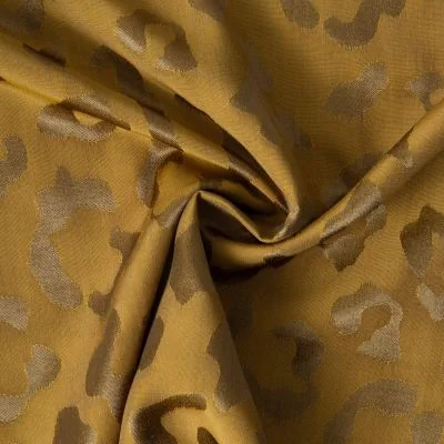 Tissu Polyviscose Ayana léopard Doré sur fond Moutarde - Par 10 cm