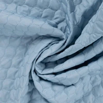 Tissu Doudoune matelassé déperlant uni Bleu ciel - Par 10 cm