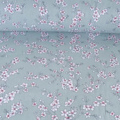 Tissu Coton imprimé Fleur d&#039;amandier sur fond Vert menthe - Par 10 cm