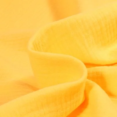 Tissu Double gaze de coton uni Jaune vif - Par 10 cm
