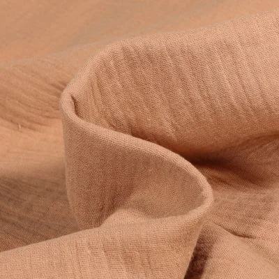 Tissu Double gaze de coton uni Cassonade - Par 10 cm