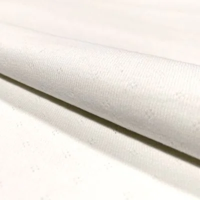 Tissu Jersey Coton ajouré Baby Blanc cassé - Par 10 cm