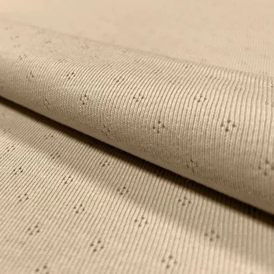 Tissu Jersey Coton ajouré Baby Beige - Par 10 cm