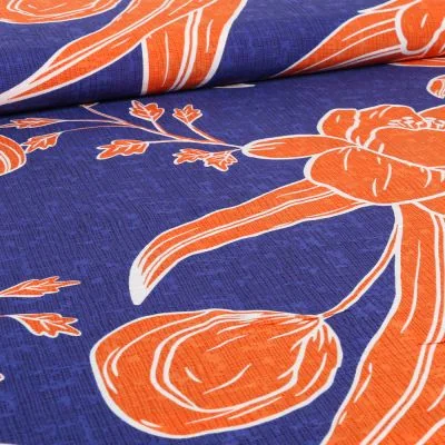 Tissu Viscose Hawa orange sur fond Bleu roi - Par 10 cm