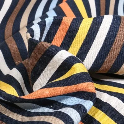 Tissu Lin Viscose Rayures multicolores sur fond Bleu marine - Par 10 cm
