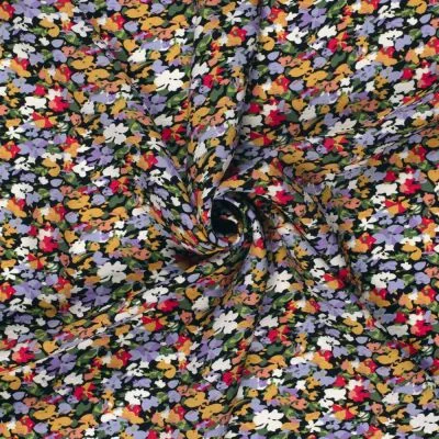 Tissu Crêpe de Viscose fleurs Lia sur fond Noir - Par 10 cm