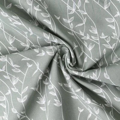 Tissu Popeline de Coton  feuilles Alexia sur fond Vert kaki clair - Par 10 cm