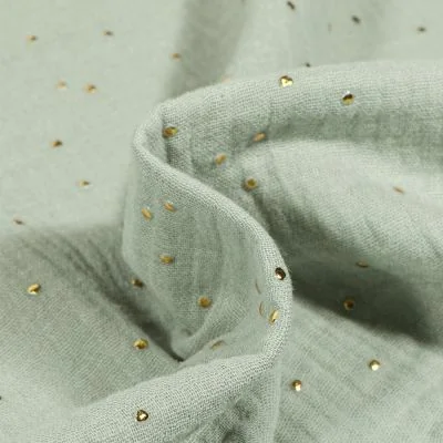 Tissu Double gaze Baya Pois dorés sur fond Vert d&#039;eau - Par 10 cm