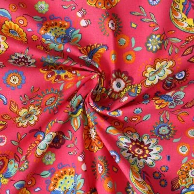 Tissu Popeline de Coton  Paréo fleurs multicolores sur fond Rose fuchsia - Par 10 cm
