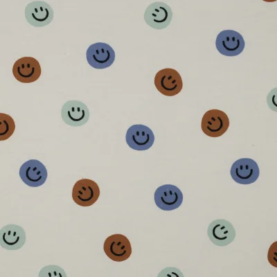 Tissu Flanelle de Coton Zoé smiley Marron sur fond Ecru - Par 10 cm