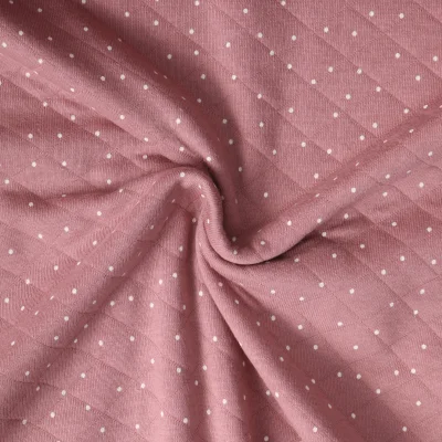 Tissu Matelassé pois Céline sur fond Mauve clair - Par 10 cm