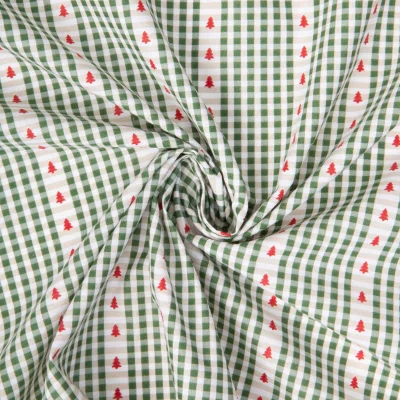 Tissu Coton imprimé Arty St Gervais petits carreaux et sapins sur fond Vert - Par 10 cm