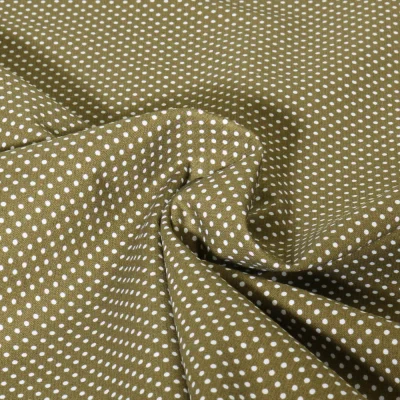 Tissu Popeline de Coton  Carmella à pois blanc sur fond Vert kaki - Par 10 cm