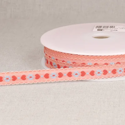 Ruban imprimé 15 mm coeurs sur fond Saumon x1m
