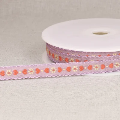 Ruban imprimé 15 mm coeurs sur fond Parme x1m