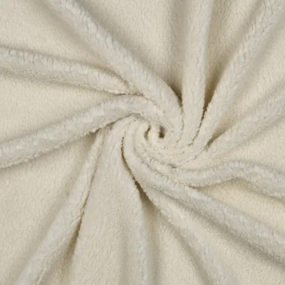 Tissu Fausse fourrure Mouton Teddy uni Ivoire - Par 10 cm