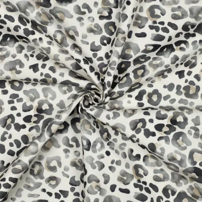 Tissu Déperlant impression digital léopard brumeux sur fond Blanc cassé - Par 10 cm