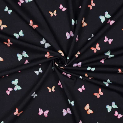 Tissu Jersey Coton imprimé digital Lea petits papillons Multicolores sur fond Bleu marine - Par 10 cm