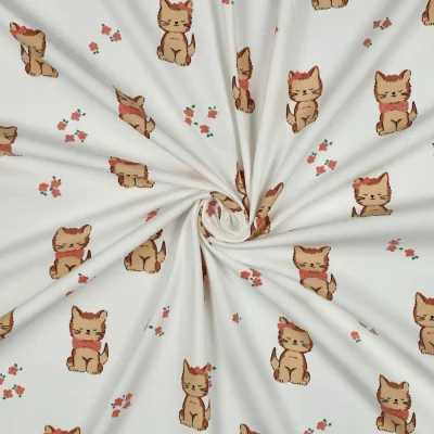 Tissus Jersey Coton imprimé chatons noeuds pailletés sur fond Blanc - Par 10 cm
