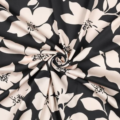 Tissu Viscose élasthanne stretch Grandes fleurs Blanc cassé sur fond Noir - Par 10 cm
