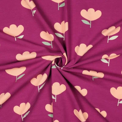 Tissu Jersey Coton imprimé Zoé tulipes Pêche sur fond Prune - Par 10 cm