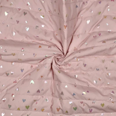 Tissu Matelassé réversible Tess coeurs brillant sur fond Rose pâle - Par 10 cm