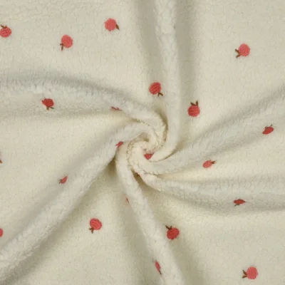 Tissu Bouclette Teddy Pêches brodées sur fond Blanc cassé - Par 10 cm