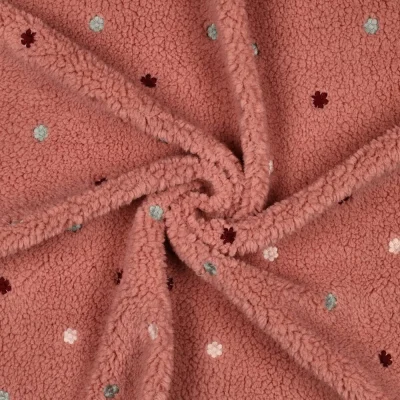 Tissu Fausse fourrure Mouton Teddy petites fleurs brodées sur fond Rose - Par 10 cm