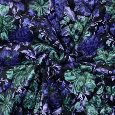 Tissu Velours ras Matelassé réversible digital Livia floral Violet et Vert sur fond Noir - Par 10 cm