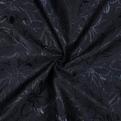 Tissu Jacquard léger Motifs floraux stylisés sur fond Bleu marine - Par 10 cm