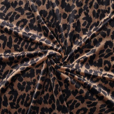 Tissu Jersey Velours tout doux motifs Léopard Noir sur fond Marron - Par 10 cm