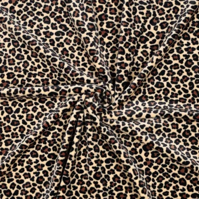 Tissu Jersey Velours tout doux motif Léopard Noir et Marron sur fond Beige - Par 10 cm