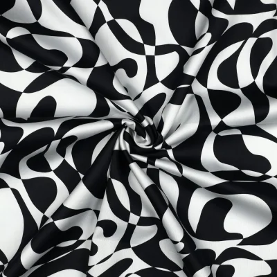 Tissu Coton satiné Iris motif abstrait Noir sur fond Blanc - Par 10 cm