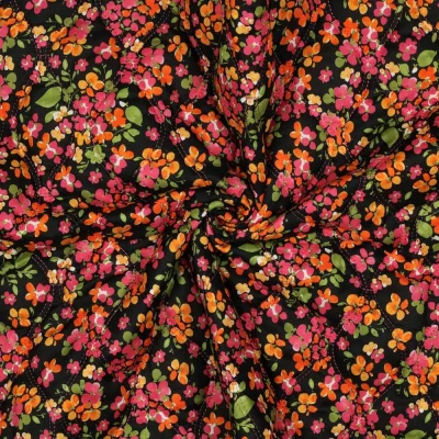 Tissu Coton Matelassé réversible digital Lio tapis de fleurs sur fond Noir - Par 10 cm