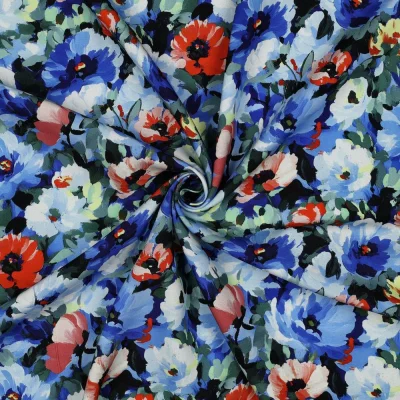 Tissu Viscose imprimé digital Alba fleurs Bleu sur fond Noir - Par 10 cm