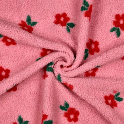 Tissu Bouclette imprimé Fleuris sur fond Rose - Par 10 cm
