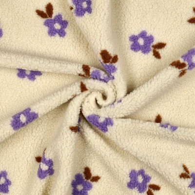 Tissu Bouclette imprimé Fleuris sur fond Ecru - Par 10 cm