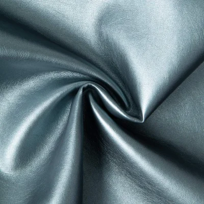 Tissu Simili cuir d&#039;habillement métallisé souple uni Vert d&#039;eau - Par 10 cm