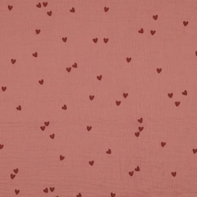 Tissu Double gaze Petits coeurs foncés sur fond Vieux rose - Par 10 cm