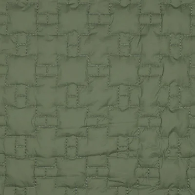 Tissu Doudoune croix imbriquées Aria sur fond Vert gazon - Par 10 cm