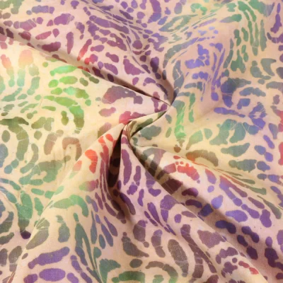 Tissu Viscose Batik Nuances arc-en-ciel sur fond Beige - Par 10 cm