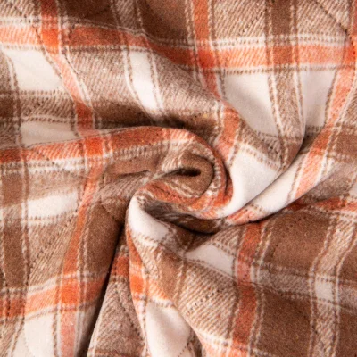 Tissu Matelassé Ciarra tout doux  envers doudoune carreaux Oranges et Bruns sur fond Beige - Par 10 cm