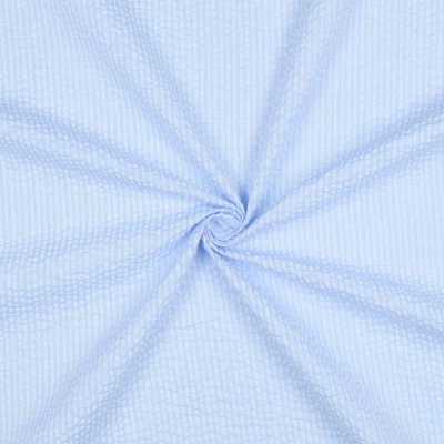 Tissu Seersucker Coton Rayures sur fond Bleu clair - Par 10 cm