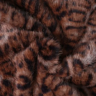 Tissu Fausse fourrure Léna motif panthère Noir sur fond Marron chocolat - Par 10 cm