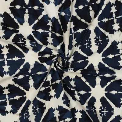 Tissu Batik de Coton étoilés sur fond Bleu nuit - Par 10 cm