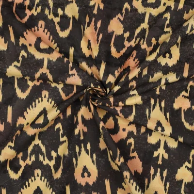 Tissu Batik de Coton motif ethnique Beige doré sur fond Noir profond - Par 10 cm