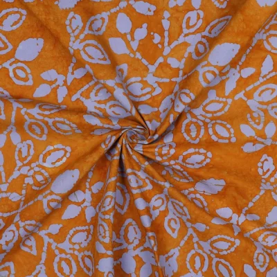 Tissu Batik Coton Azura sur fond Rouille - Par 10 cm