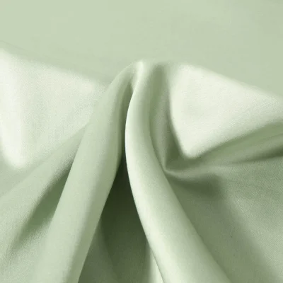 Tissu Satin de Coton uni Vert amande - Par 10 cm