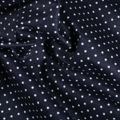 Tissu Coton enduit Petits pois blancs sur fond Bleu marine - Par 10 cm