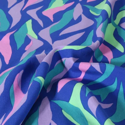 Tissu Viscose lenzing EcoVero Flammes Tropicales sur fond Bleu roi - Par 10 cm